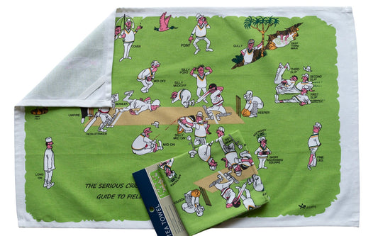 Green tea towel with cricket-themed design on a white background
