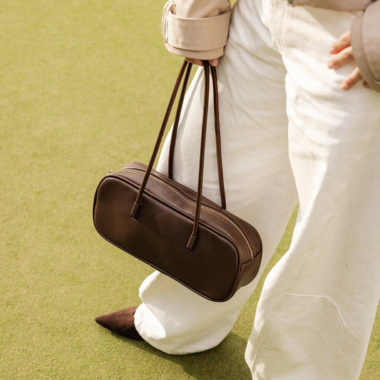 Chocolate brown vegan leather shoulder bag with double handles and zip closure view from top