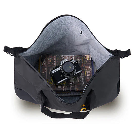 Black camera bag with a camera inside on a white background