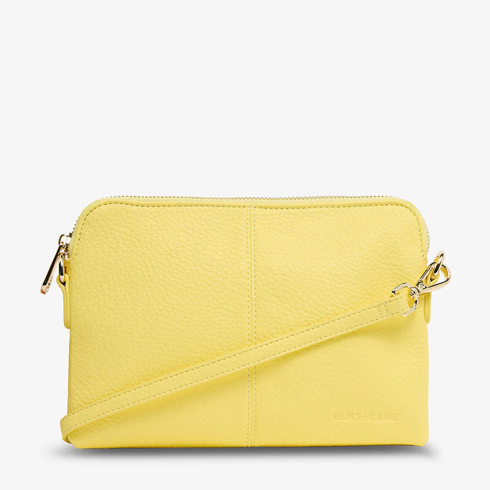 Yellow crossbody bag on a white background