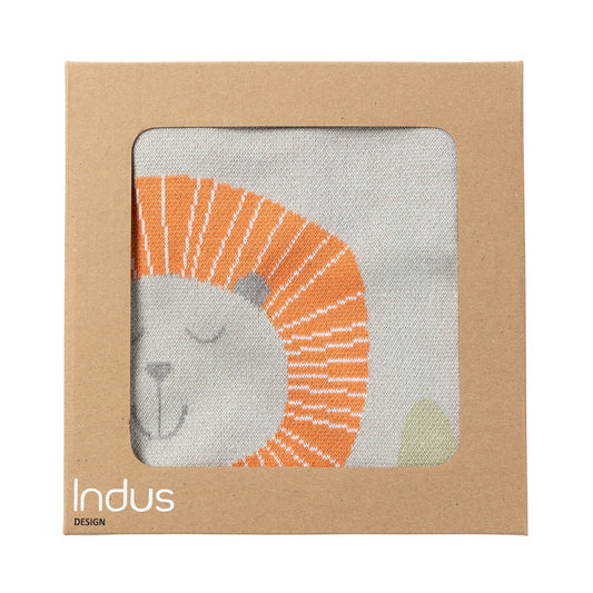 Product packaging with a lion design and 'Indus Design' branding on a brown background