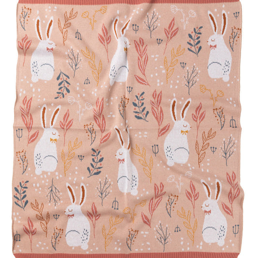 Blanket with rabbit and floral pattern on a white background