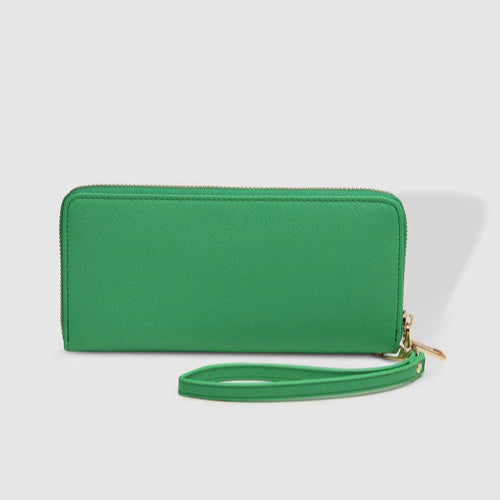 Green wallet with a wrist strap on a light gray background