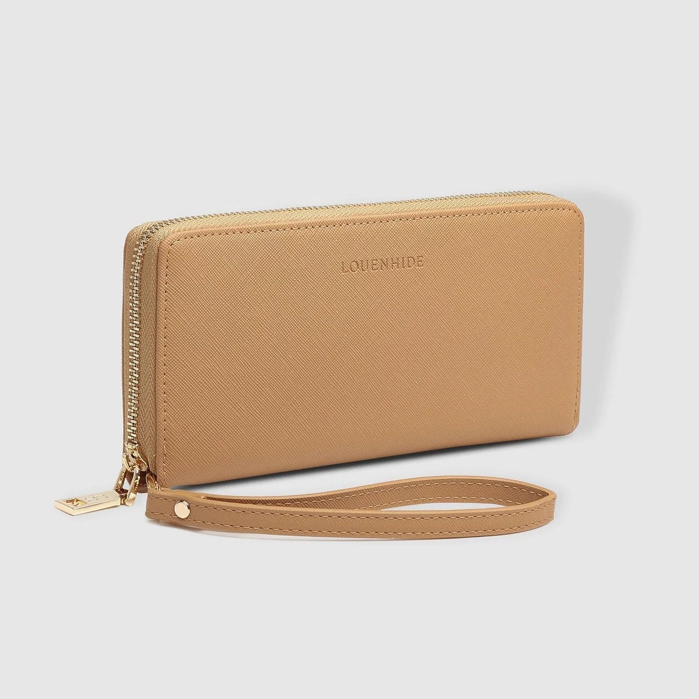 Beige wallet with a strap on a light gray background