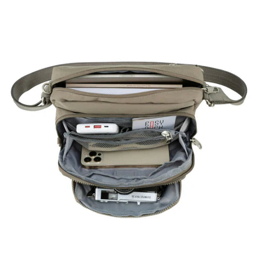 Open beige crossbody bag with electronic devices on a white background