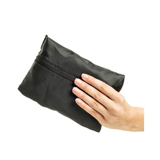 Black pouch held by a hand on a white background