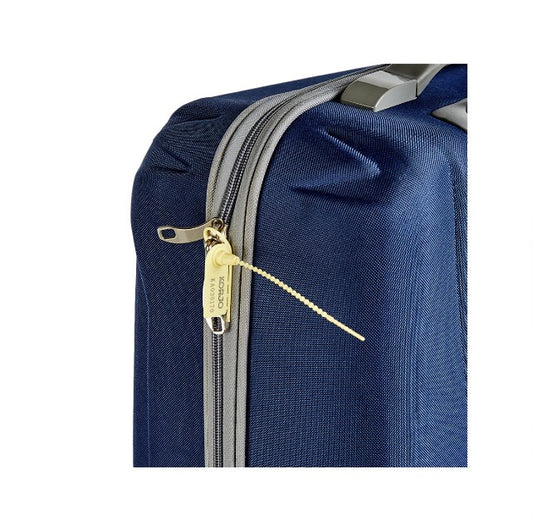 Close-up of a blue suitcase with a gold zipper on a white background