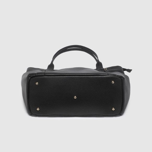 Black bag with gold studs on a light gray background