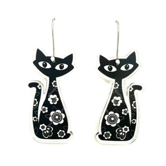 Black cat-shaped earrings with white floral patterns on a white background