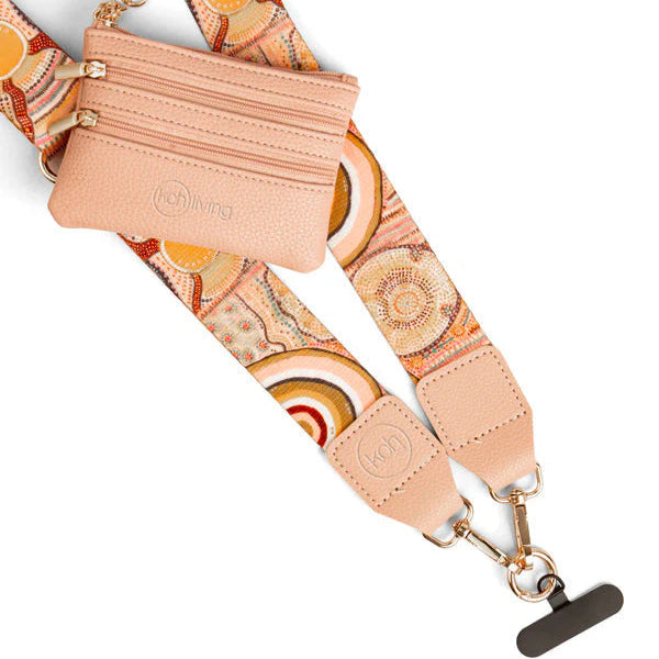 Beige bag strap with colorful pattern and visible brand logo on a white background