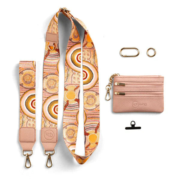 Set of accessories including a patterned strap, cardholder, and clips on a white background