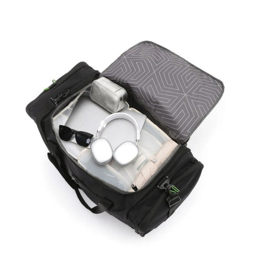 Black duffle with geometric patterned compartment on a white background