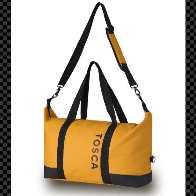 Yellow duffel bag with black straps and 'TOSCA' branding on a white background