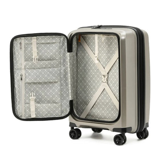 Open suitcase with patterned interior on a white background
