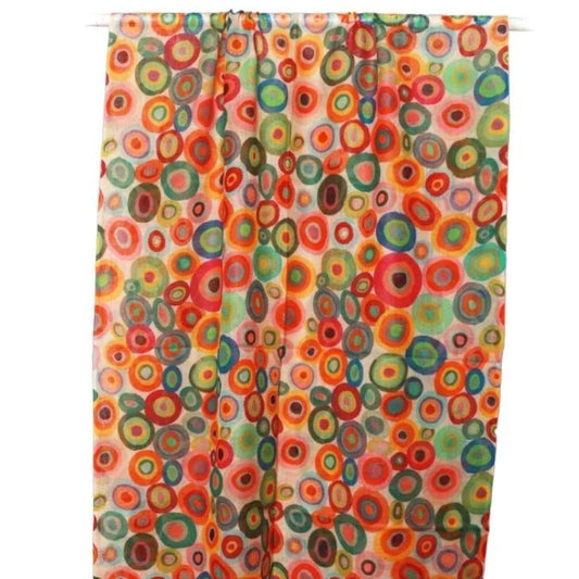 Colorful circular patterned fabric on a white background