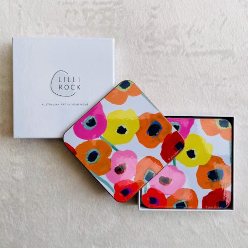 Elevate dining with the ‘Haniwick’ placemat & coaster set by Anna Blatman. Gloss finish, cork backing, and vibrant art in a boxed set of four.