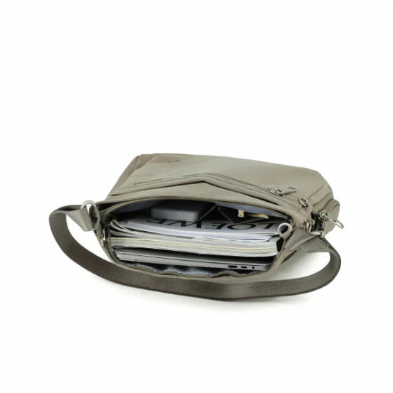 Open beige bag with compartments on a white background