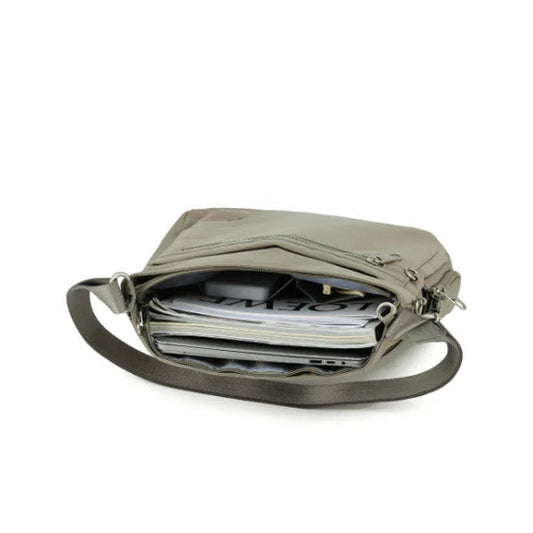 Open beige bag with compartments on a white background