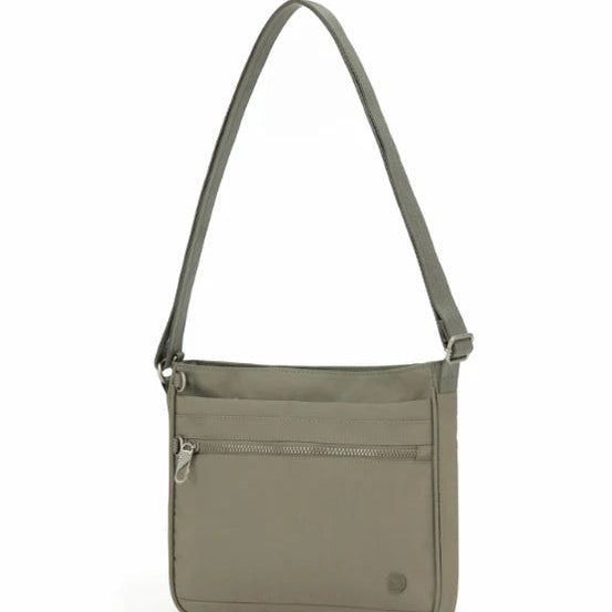 Green crossbody bag on a white background
