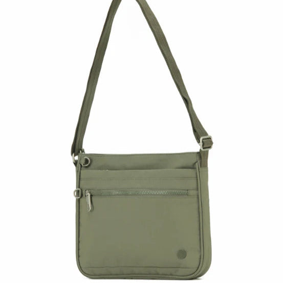 Green crossbody bag on a white background