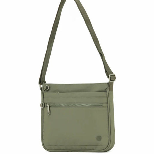 Green crossbody bag on a white background