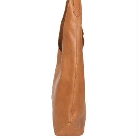 Brown leather handbag on a white background