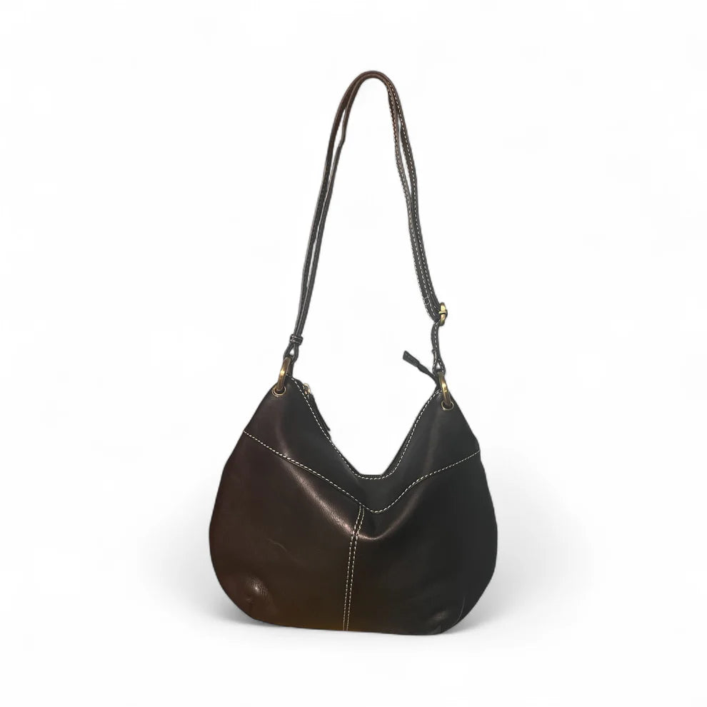Brown leather handbag with a strap on a white background