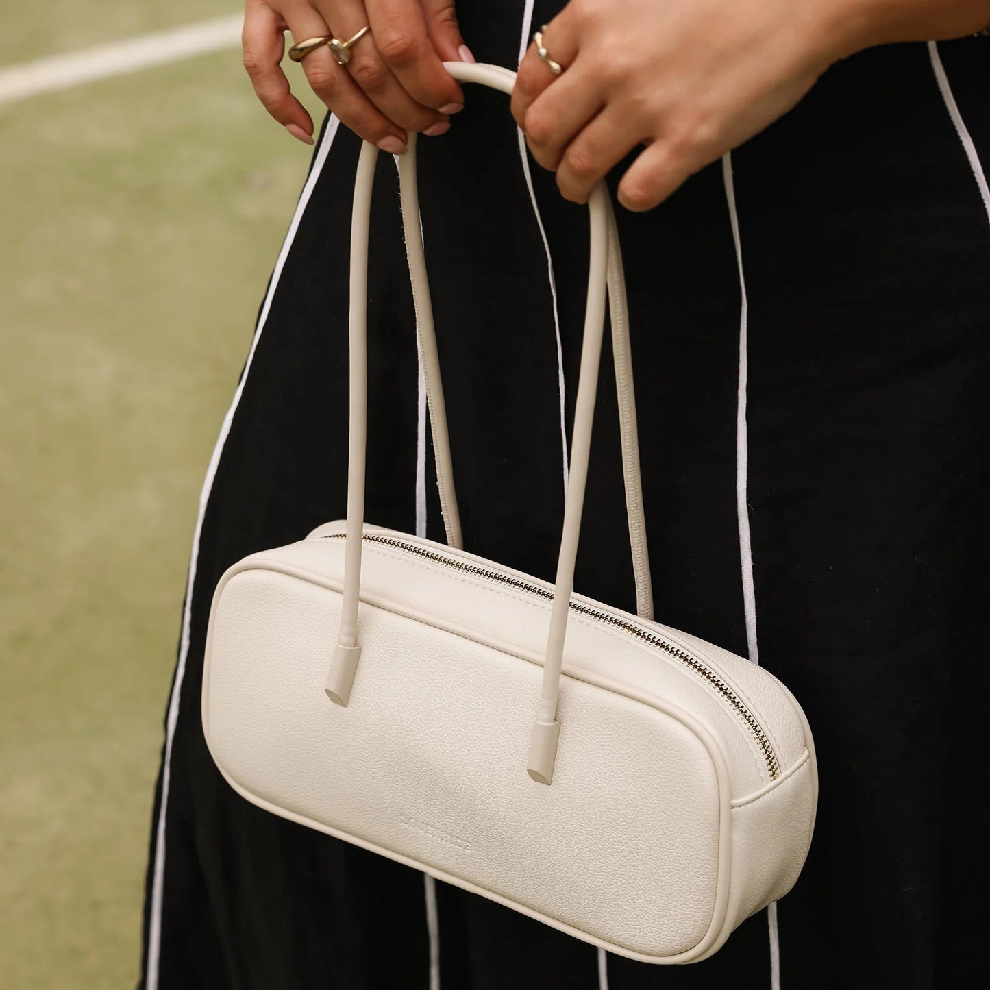 Structured women’s shoulder bag in vanilla vegan leather, versatile for work or weekend