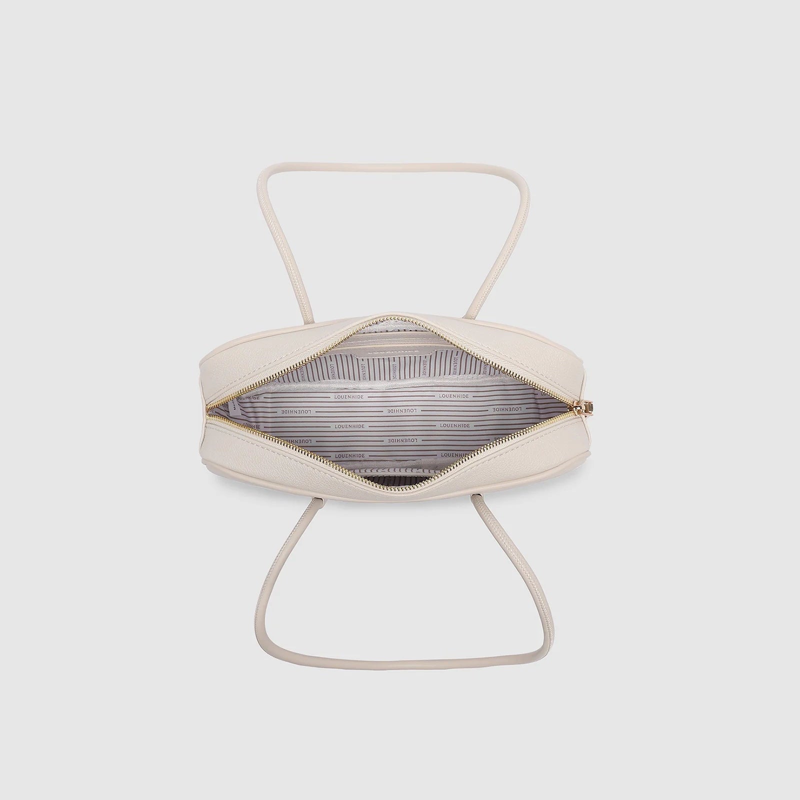 Vanilla vegan leather shoulder bag with double handles and zip closure interior view