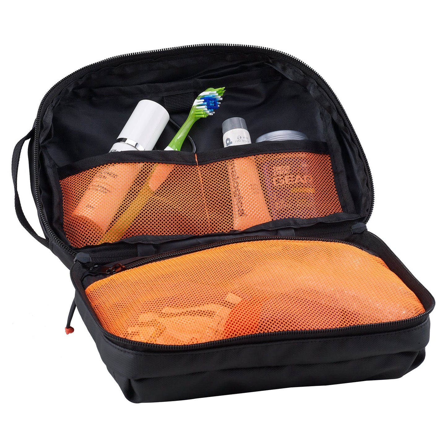 Open travel toiletry bag with orange mesh compartments and black exterior, containing various items.