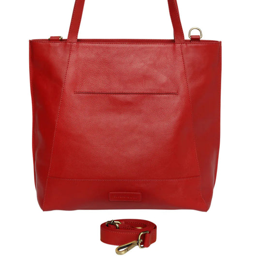 Red leather tote bag with a matching strap on a white background