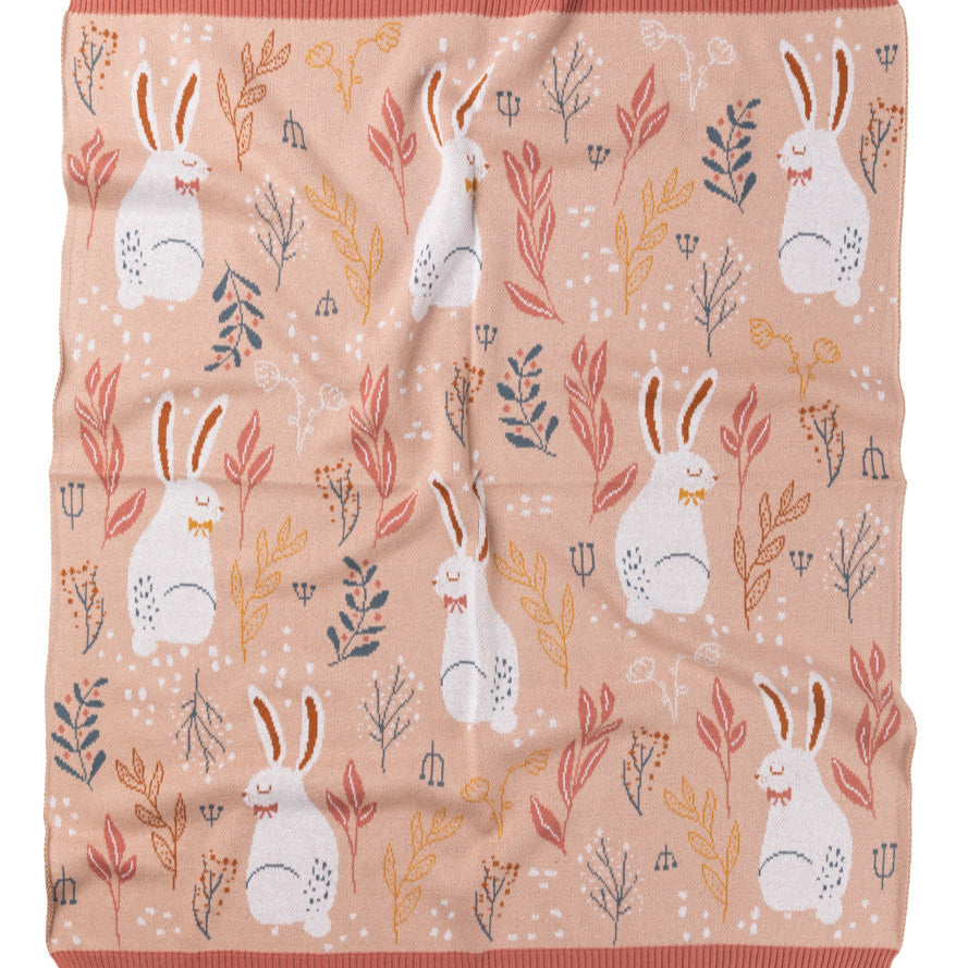 Blanket with rabbit and floral pattern on a white background