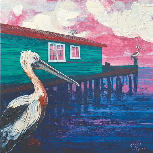 Painting of a pelican by a dock with a small houseboat and pink sky.