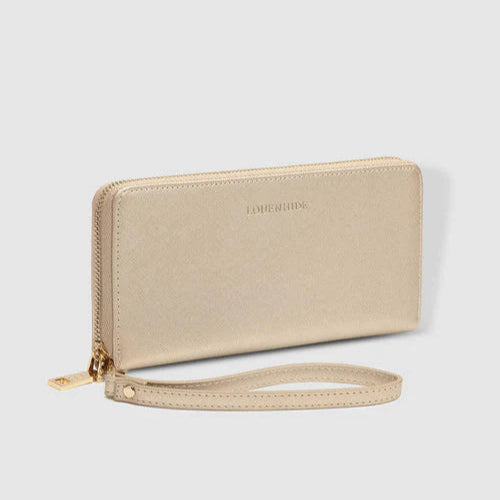 Beige wallet with a strap on a light gray background
