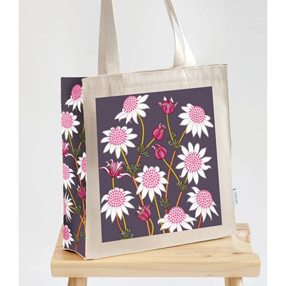 Tote bag with floral design on a white background