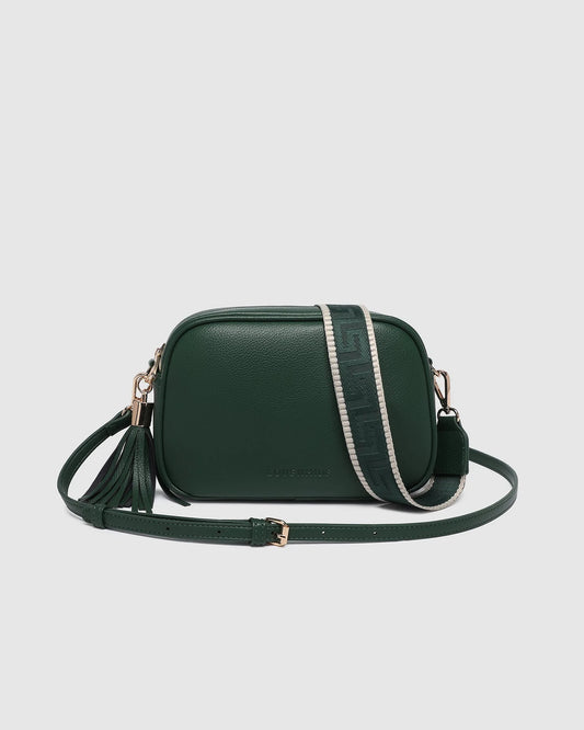 Green leather crossbody bag on a light gray background