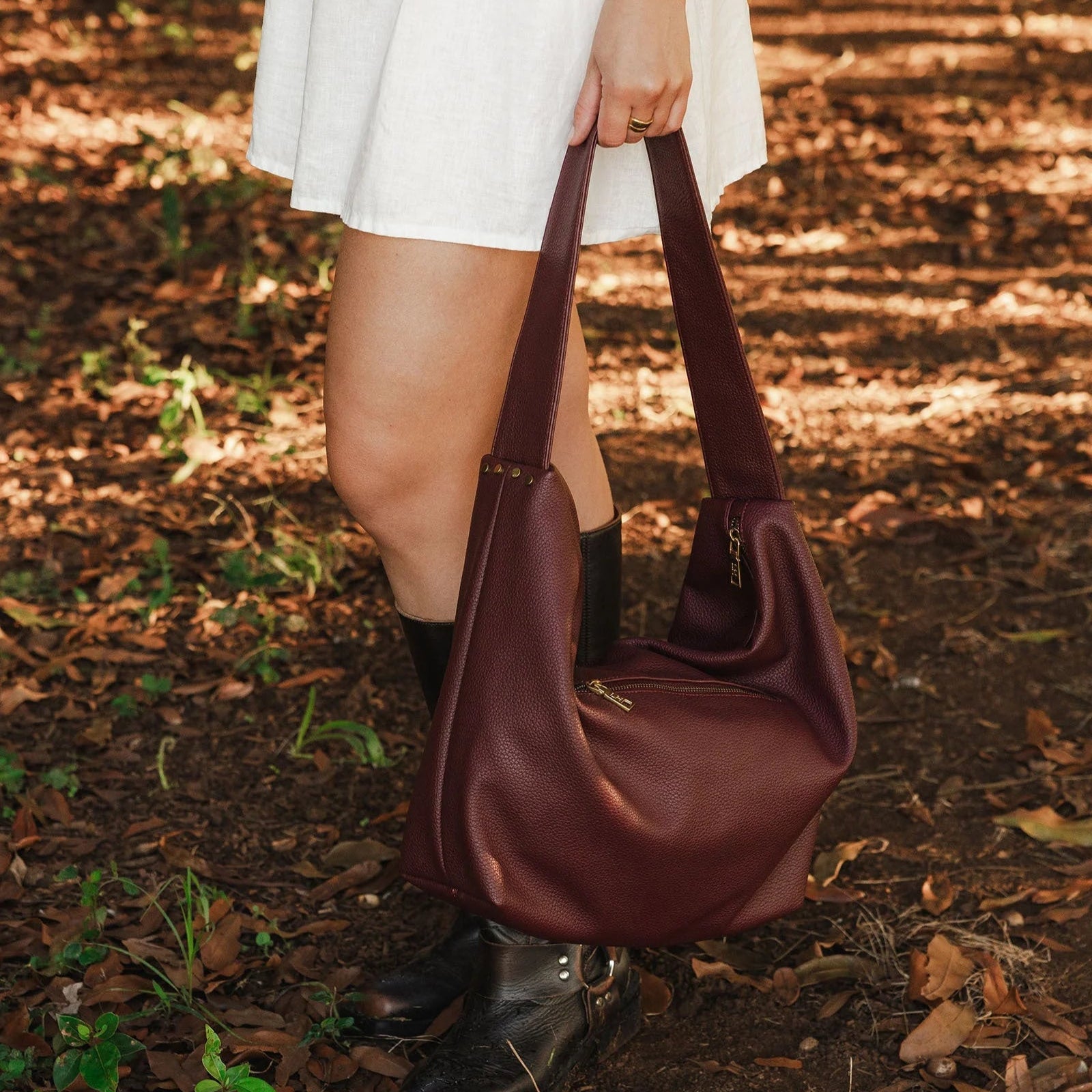Louenhide oversized slouchy burgundy handbag styled with soft structure and stud accents