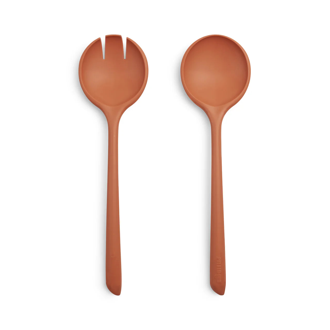 Set of two terracotta-colored salad servers on a white background