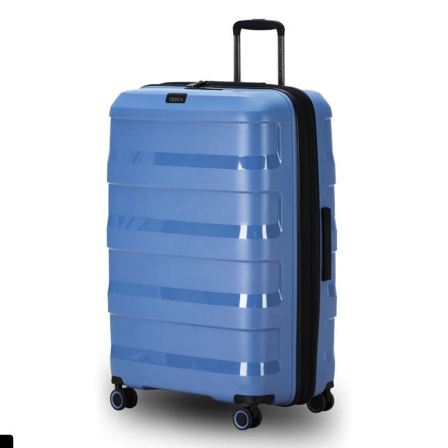 Blue suitcase with black handle and wheels on a white background