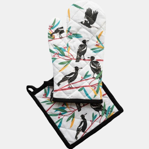 Set of oven mitt and pot holder with bird design on a white background