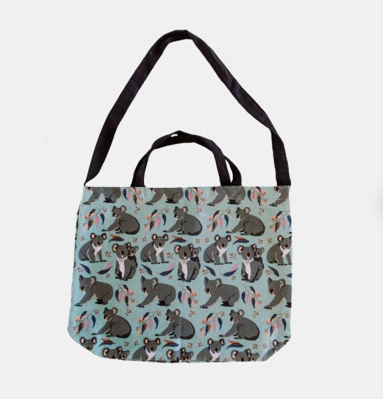 Tote bag with koala pattern on a light blue background