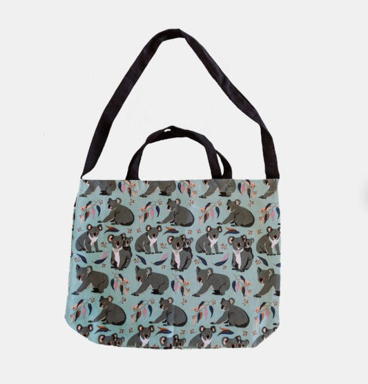 Tote bag with koala pattern on a light blue background