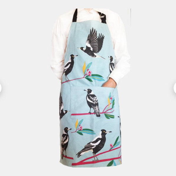 Apron with bird design on a light blue background