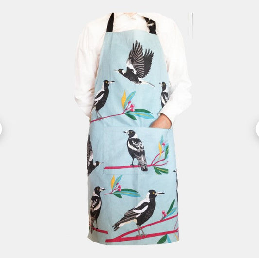 Apron with bird design on a light blue background