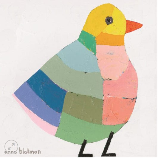 Colorful duck-shaped object with patchwork pattern on a white background