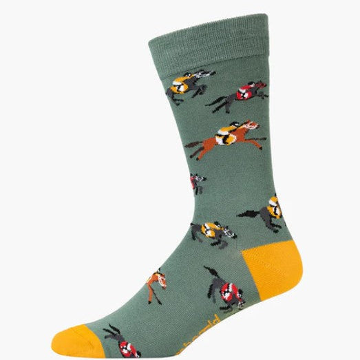 Green sock with horse and jockey pattern on a white background