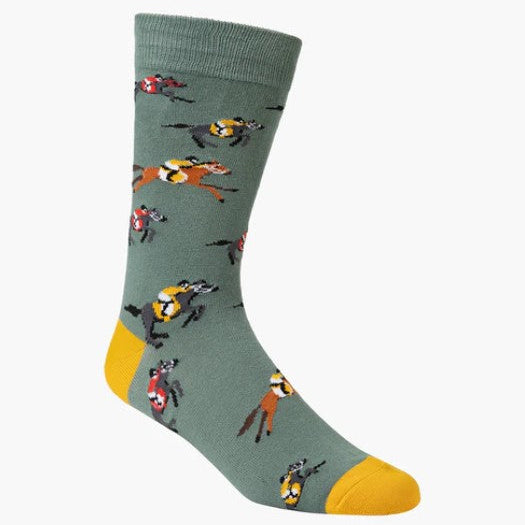 Sock with horse and jockey pattern on a green background