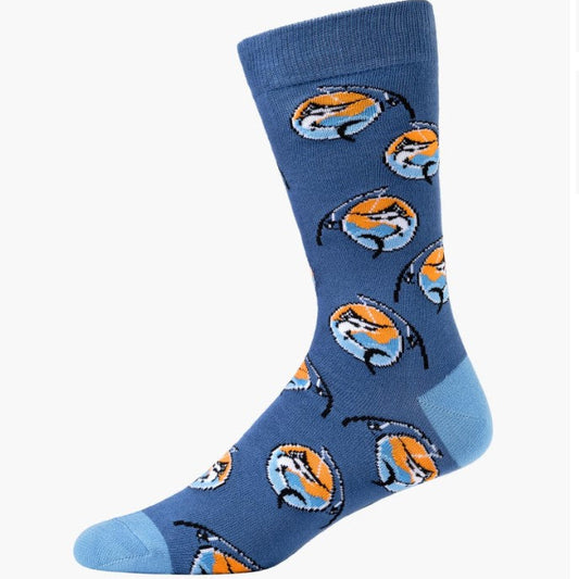 A single crew sock in medium blue with a repeating pattern of cartoon fish in orange, light blue, and white, shown on a plain light gray background.
