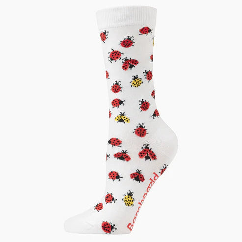 White sock with ladybug pattern on a white background
