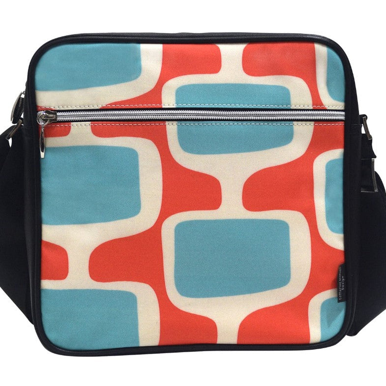 Patterned bag with geometric design on a white background